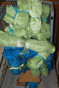 lot 53 image: Sheer fabric pieces in lime green and bright blue