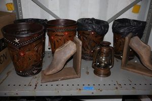 lot 39 image: Western style small trash cans, lantern, and foot shaped bookends