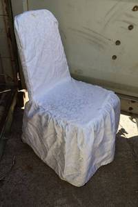 lot 62 image: White chair covers with Brocadefloral design fabric - about 20 count with table linens
