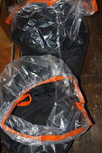 lot 254 image: Black table linens - 2 bags