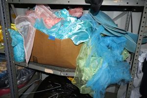 lot 93 image: Light blue, pink and green fabric table decorations with blue fairy wings