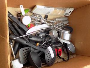 lot 26 image: kitchen utensils and measuring cups- also a hand mixer