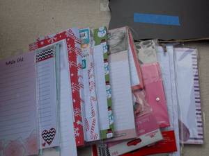 lot 27 image: note pads and a small chalk board