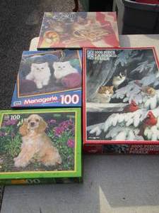 lot 29 image: small box of puzzles opened so unsure if piece count matches