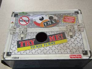 lot 75 image: tickle me Elmo