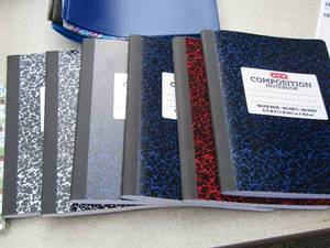 lot 98 image: folders, composition notebooks, and note pads