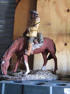 lot 2 image: WESTERN HORSE AND COWBOY STATUE 1 EAR IS BROKEN
