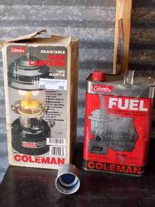 lot 99 image: Coleman GREEN GAS LANTERN, EMPTY Coleman FUEL CAN AND SMALL FUNNEL