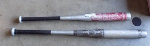 lot 104 image: 1 IS A LOUISVILLE SLUGGER BASEBALL BAT , OTHER IS OFFICIAL TEN PRO SOFTBALL