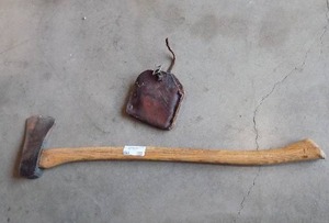 lot 105 image: AXE WITH LEATHER COVER