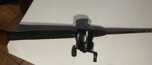 lot 10 image: ABU GARCIA AMBASSADEUR BLACK MAX 3600  BAITCASTING REEL & SHAKESPEAR UGLY STICK ROD
