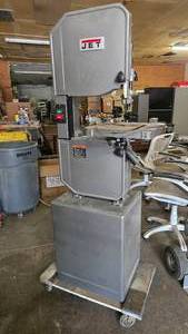 lot 55 image: JET 14 MetalWood Vertical Bandsaw w Cabinet, Model J-8201K.  TESTED