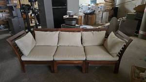 lot 62 image: Very Nice Outdoor Wooden Flared Arm Sofa w Cushions