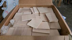 lot 139 image: Massive Box of 14 Pre-Cut Wood Pieces.  All measure 6 x 4.Total quantity approx 800.  THESE WERE LASER ENGRAVED TO MAKE CUSTOM DRINK COASTERS.