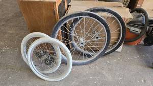 lot 150 image: Lot of 4 Tires.  Includes 2 Marathon 26 Solid Cart Tires & 2 White BMX Tires