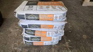 lot 233 image: 5 Bags of Sakrete 50lb Crack Resistant Reinforced Concrete Mix.  Bags are soft and mix is fresh.