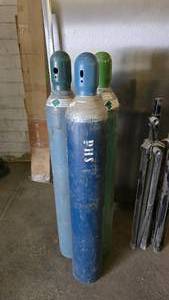 lot 258 image: Welding Tanks w UN1956 Compressed Welding Gas.  Tanks feel full.  QUANTITY 3 TANKS  BID IS TIMES THE QUANTITY SO YOU ARE BIDDING PER TANK