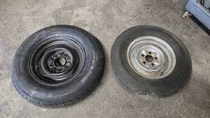 lot 326 image: Lot of 2 Trailer Tires.  1 tire looks new