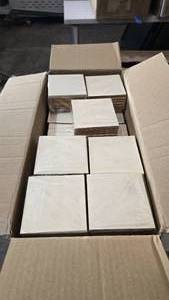 lot 335 image: Large Box Full of Pre-Cut Wood Coasters.  Approx 1,000 Pieces