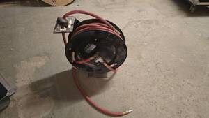 lot 379 image: Central Pneumatic Retractable 50 Air Hose Reel
