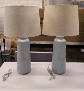 lot 100 image: Pair of Matching Ceramic Light Blue Lamps w Cream Lamp Shades