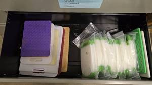 lot 98 image: Contents of Shelf.  Large Lot of Cutting Boards.