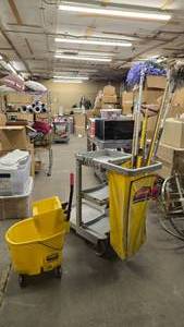 lot 149 image: Large Lot of Janitorial Supplies.  Included Mop Bucket, Rubbermaid Cart & Supplies