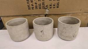 lot 243 image: Lot of 3 Matching Bare Concrete Style Planter Pots
