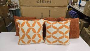 lot 321 image: Lot of 6 Orange Throw Pillows.  Includes 4 Orange 18 Pillows & 2 Orange & Cream 18 Pillows