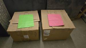 lot 327 image: 2 Large Boxes Full of Green & Pink Gift Bags
