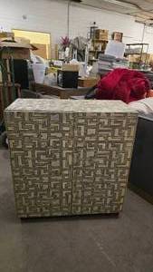 lot 337 image: Cabinet w Geometric Design Front.  Has damage.
