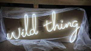 lot 365 image: Absolutely Beautiful Wild Thing LED Wall Sign