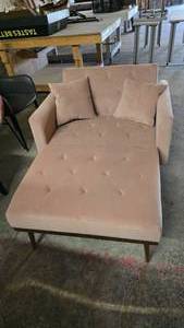 lot 410 image: Mid-Century Style Pink Wide Seat Arm Chair w Pillows & Removeable Foot Rest.  Also converts to a single bed