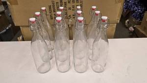 lot 435 image: Lot of 12 Glass Swing Top Bottles