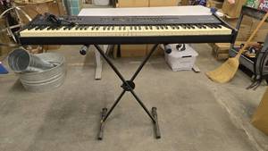 lot 448 image: Alesis QS8 Vintage Synthesizer Keyboard w Stand