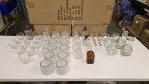 lot 557 image: Large Lot of Misc Glass.  Includes Candle Holders & More.  Over 65 Pieces