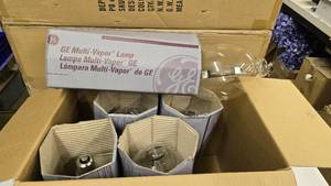 lot 558 image: NEW Lot of 5 GE Multi-Vapor 1000 Watt Bulbs.  Model MVR1000U