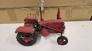 lot 596 image: Red Metal Dcor Tractor.  Approx 10 Long