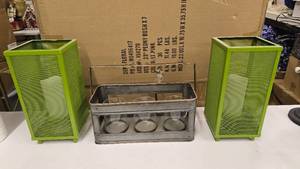 lot 632 image: Lot of Misc Dcor.  Includes 2 Green Metal Candle Lanterns & Metal Carry Basket w Glass Candle Votives