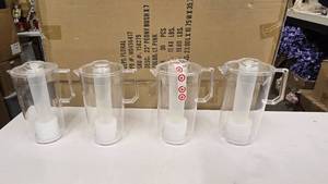 lot 685 image: Lot of 4 Clear Acrylic Pitchers w Built-In Ice Stick