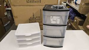 lot 673 image: Lot of 2 Plastic Storage Containers.  Black Container Has Wheels