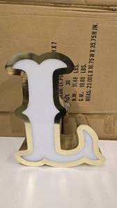 lot 731 image: Large Letter L Gold & White Channel Letter.  15 Tall.  Can be wired for light.  Would make a great dcor piece