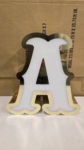 lot 733 image: Large Letter A Gold & White Channel Letter.  15 Tall.  Can be wired for light.  Would make a great dcor piece