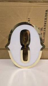 lot 735 image: Large Letter O Gold & White Channel Letter.  15 Tall.  Can be wired for light.  Would make a great dcor piece