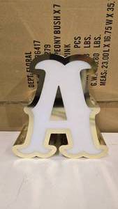 lot 794 image: Large Letter A Gold & White Channel Letter.  Can be wired for light.  Would make a great dcor piece