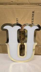 lot 796 image: Large Letter U Gold & White Channel Letter.  15 Tall.  Can be wired for light.  Would make a great dcor piece
