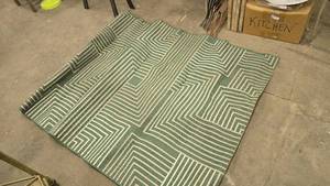 lot 801 image: Geometric IndoorOutdoor Area Rug.  Measures Approx 5 x 7