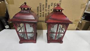 lot 839 image: Pair of Matching Red Metal Candle Lanterns.  The greenery inside is removeable.