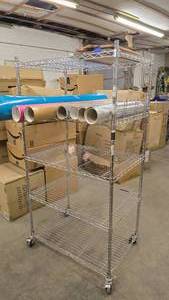 lot 879 image: Wire Rolling Shelf.  Measures 36 Wide x 18 Deep
