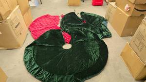 lot 882 image: Lot of 3 Christmas Tree Skirts.  Includes 2 Green Velvet (6 Wide) & 1 Red (6 Wide)